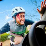 Kathy Maniura Takes The Cycling Man On the Road